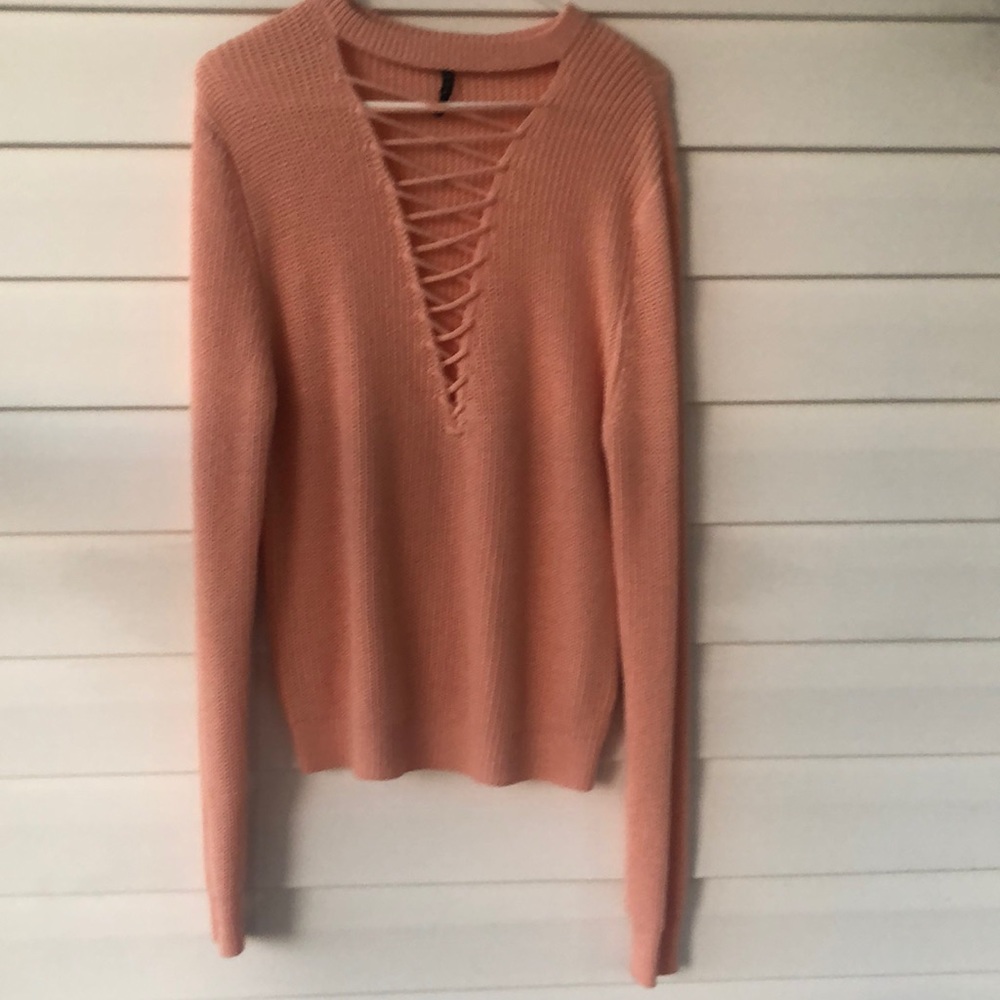 Plunging neckline…. Wear alone, with tank or sexy bandeau